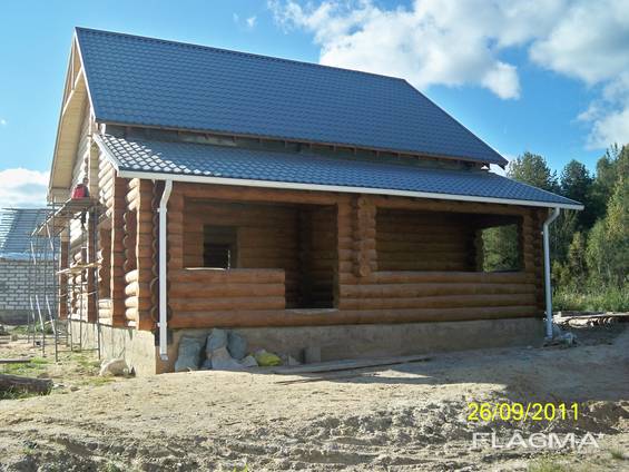 Дом из дерева ручной работы