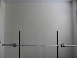 Weight bar for powerlifting and weightlifting